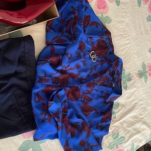 Dramatic blue and red blouse